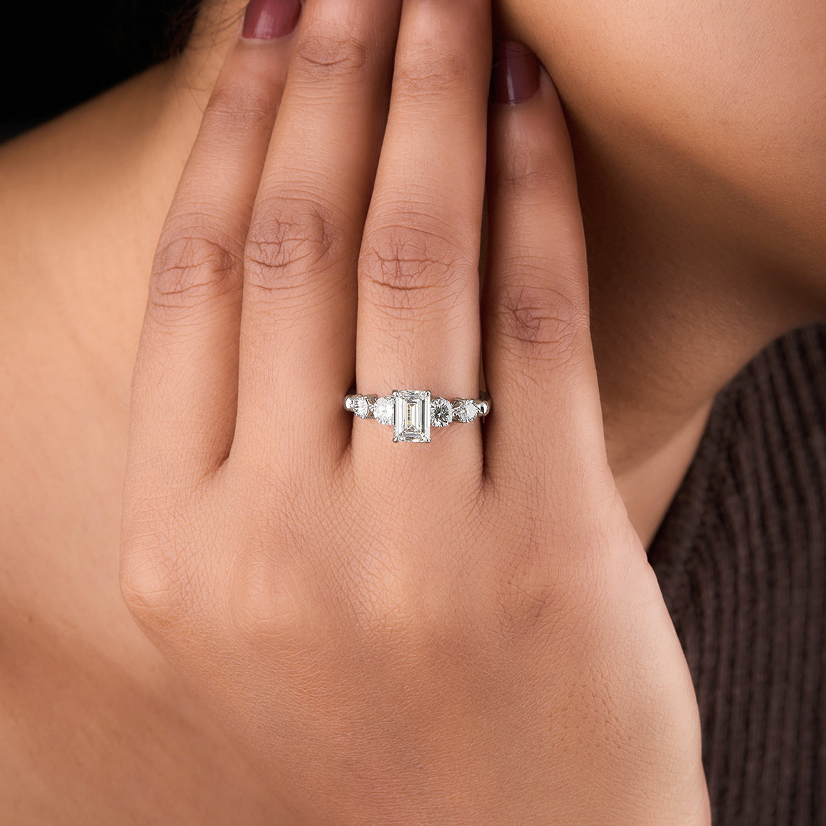 Emerald Cut Diamond Solitaire With Accent Ring.