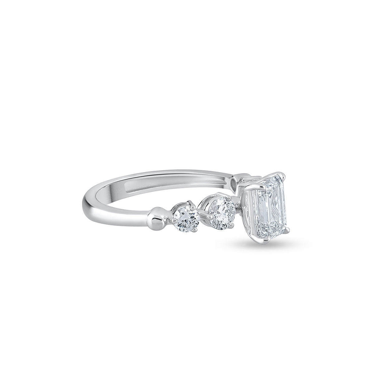 Emerald Cut Diamond Solitaire With Accent Ring.