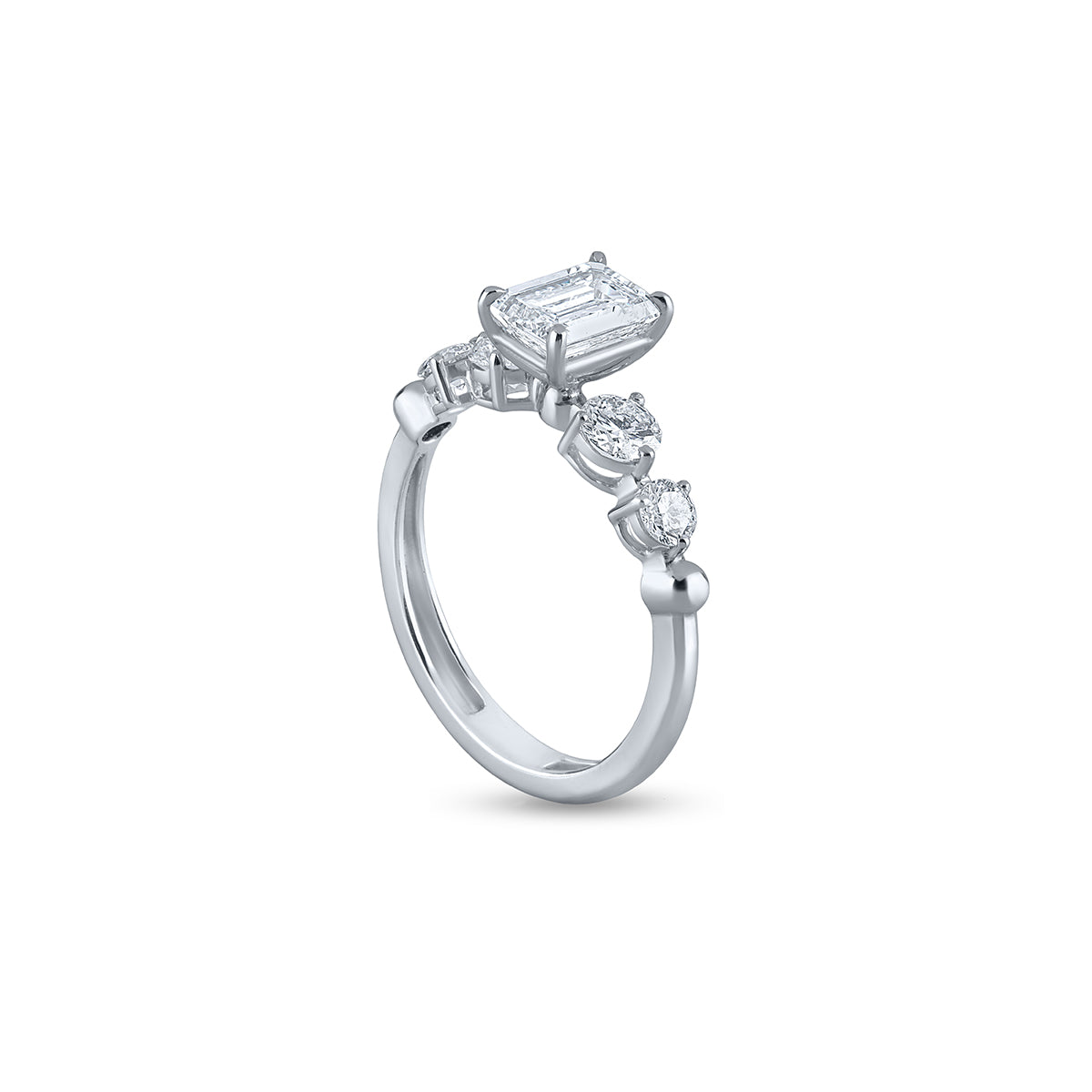 Emerald Cut Diamond Solitaire With Accent Ring.