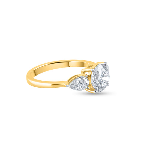 Classic 3 Stone Round and Pear Diamond Engagement Ring in Yellow Gold