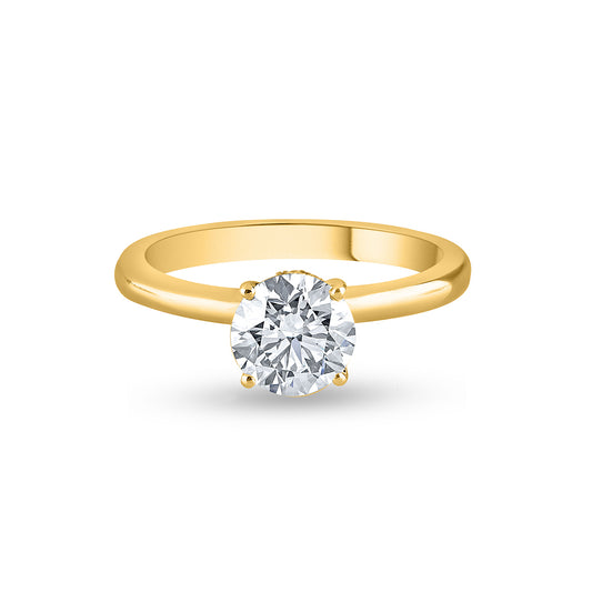 "Purecarat yellow gold solitaire ring with a round brilliant moissanite center stone. Vera 14k Yellow Gold 1.0ct. 6.5mm Moissanite Solitaire Ring available at Purecarat. Classic engagement ring design by Purecarat."
