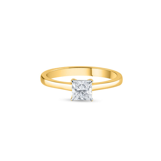 Purecarat's elegant 14k yellow gold solitaire engagement ring featuring a sparkling princess-cut diamond, a timeless and modern choice for brilliance and sophistication.