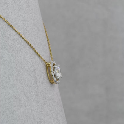Yellow gold diamond halo necklace