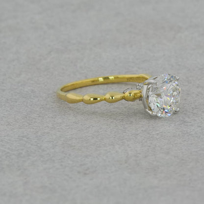 Purecarat: Timeless Yellow Gold Round Solitaire Diamond Rings