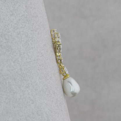 Pearl drop diamond earrings