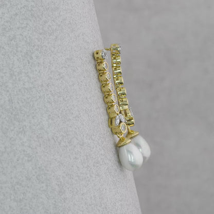 Round Cut Diamond Dangle And Drop Pearl Earrings.